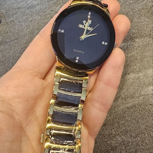 Modern quartz wristwatch new, black, unisex