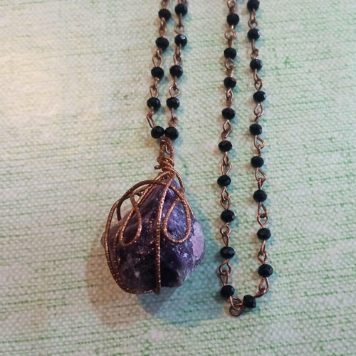 Pendant with amethyst wire-wrapped in copper and long rosary chain like new
