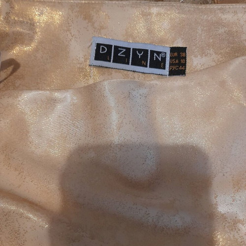 Skirt new gold color, size S