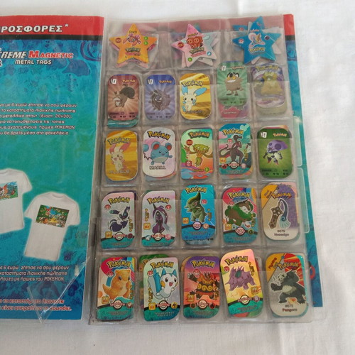 Collectible album with 132 Pokemon metal tags