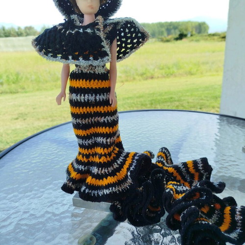 70s doll with handmade knitted clothes and metal stand