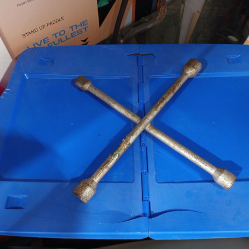 Jump cables, cross wrench, triangle and first aid kit like new