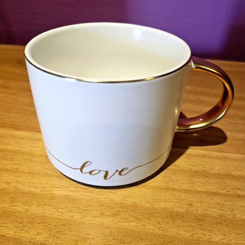 Cup like new with gold finish