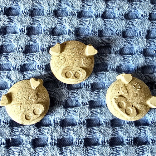 11 handmade concrete pig figurines with heart