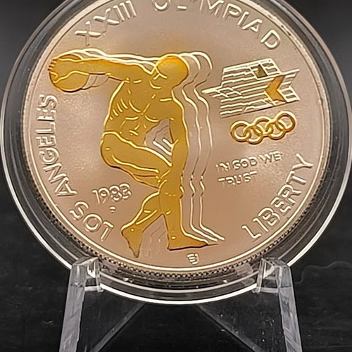 US Commemorative Dollar 1983 new, silver with 24K gold