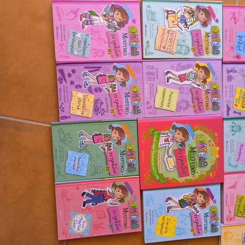 Olivia Secret Notebook like new, set of 13 books