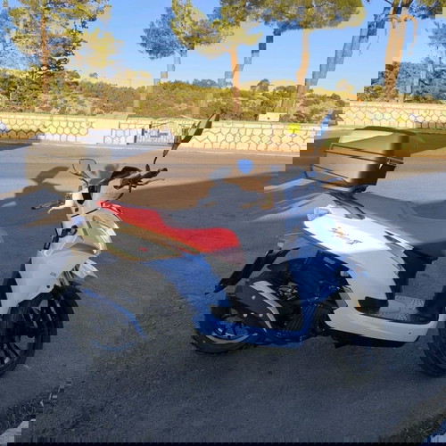 Symphony ST 125 LC ABS σαν καινούργιο, άσπρο σκούτερ με ανεμοθώρακα