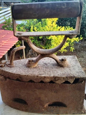 Charcoal iron used, old antique with original patina