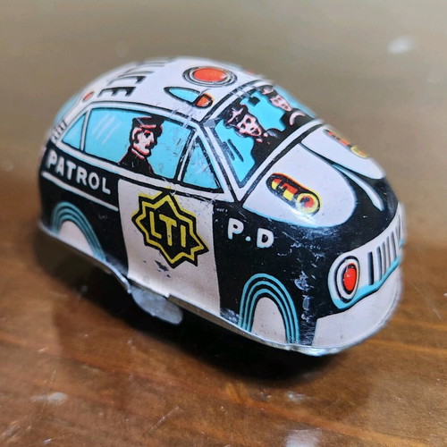 Metal wind-up police car Lucky Toy used (1999)