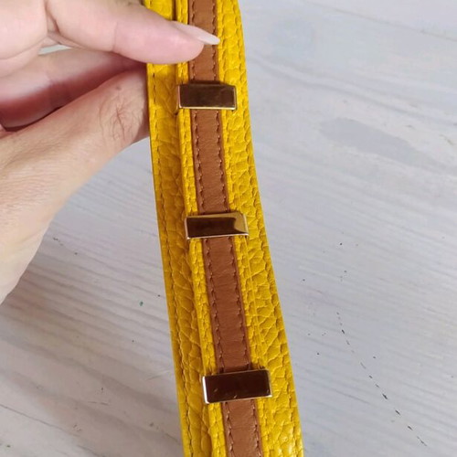 Burberry bracelet for hand like new, brown and yellow