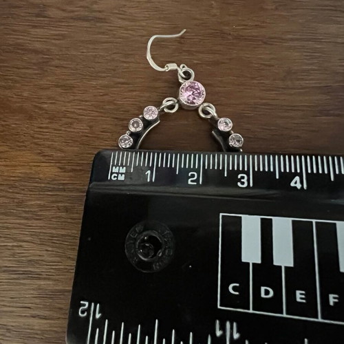 Silver chandelier earrings used with pink semi-precious stones