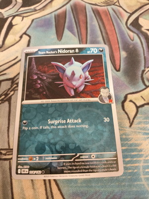 Team Rocket's NidoranF 114/182 Reverse Holo card like new