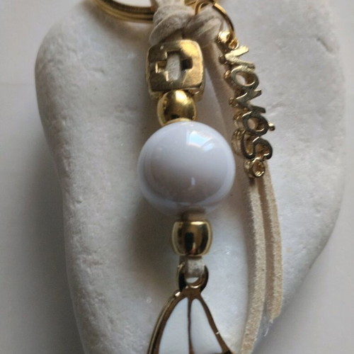 Handmade baptism favors with suede leather keychain and cross