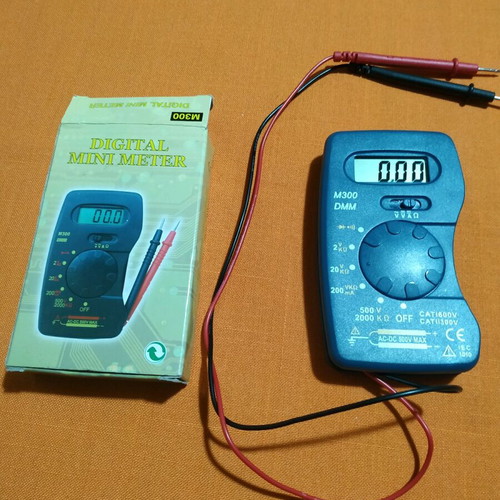 Digital mini pocket multimeter like new with 12v battery and case