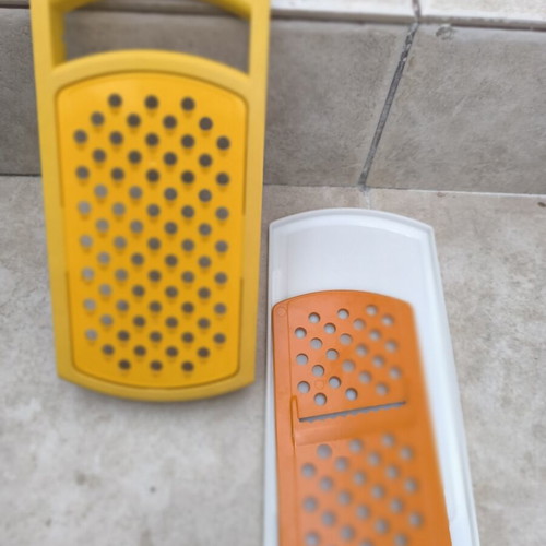 Tupperware grater with multiple cutting options