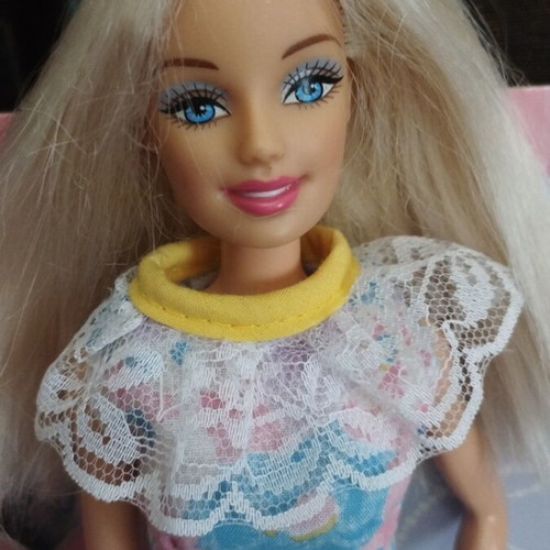 Vintage Barbie doll with vintage dress