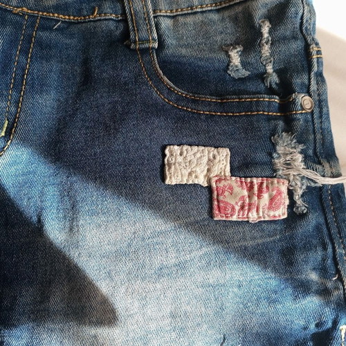 Denim shorts like new with worn details and patches, size S