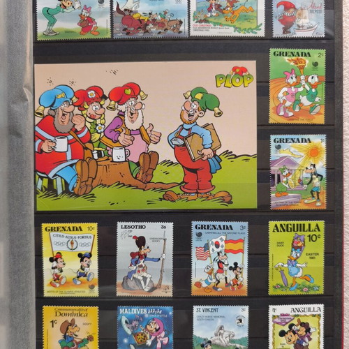 Disney collectible album with 220 stamps and 16 cards