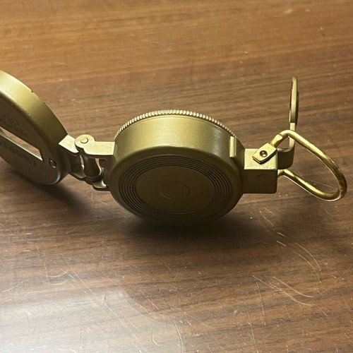 Bronze military-style compass used