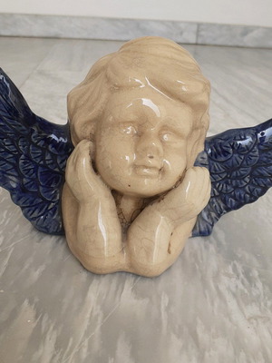 Ceramic angel used