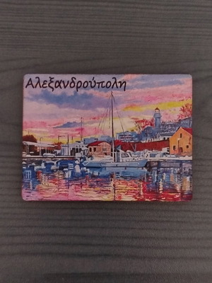 Set of 12 souvenir fridge magnets from various regions