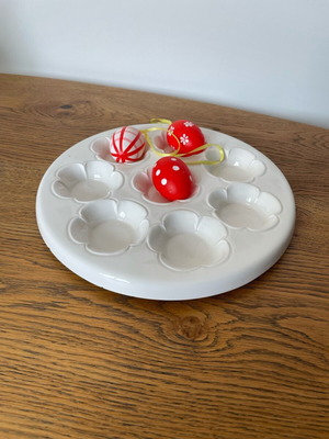 Ceramic platter for Easter eggs used with wear
