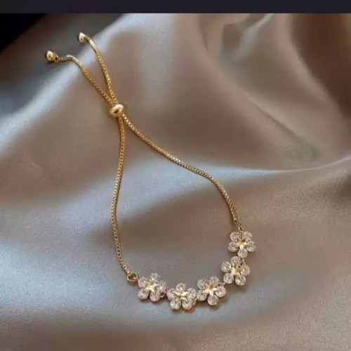 Delicate cubic zirconia bracelet new, gold and white