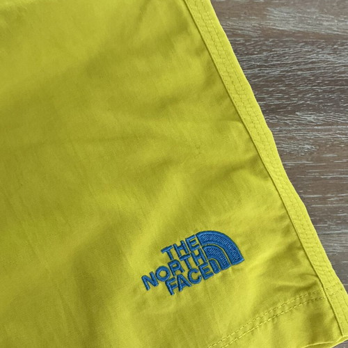 The North Face men's swim shorts like new, yellow, size S