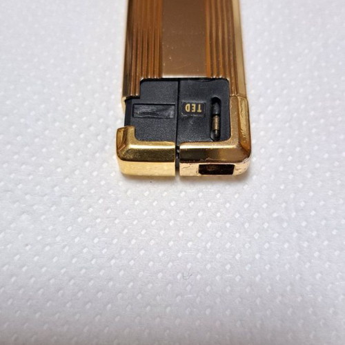 Ted Lapidus lighter used, gold plated