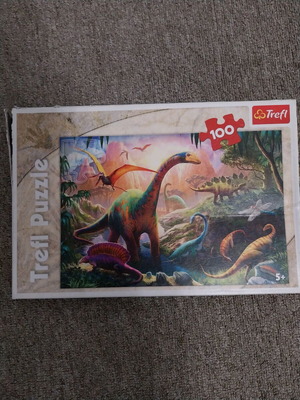 Puzzle 100 pieces used with dinosaur theme Trefl