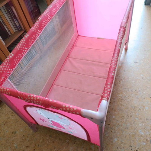 Pink baby playpen used