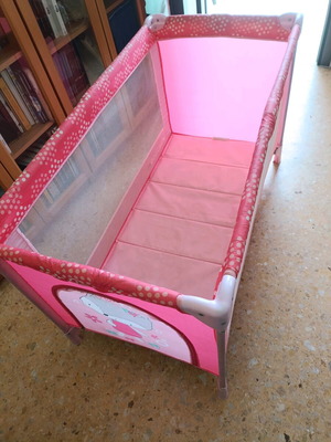 Pink baby playpen used