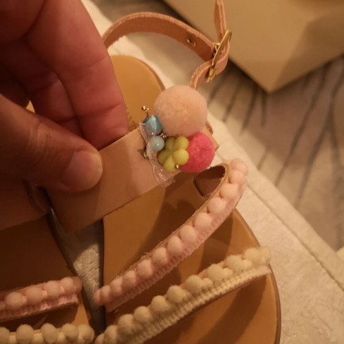 Handmade children's sandals size 30, beige with pom-poms