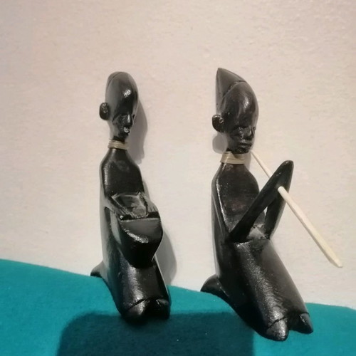 Ebony woodcarving set used, two African figures playing musical instruments