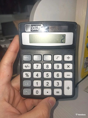Calculator like new with basic functions and batteries included