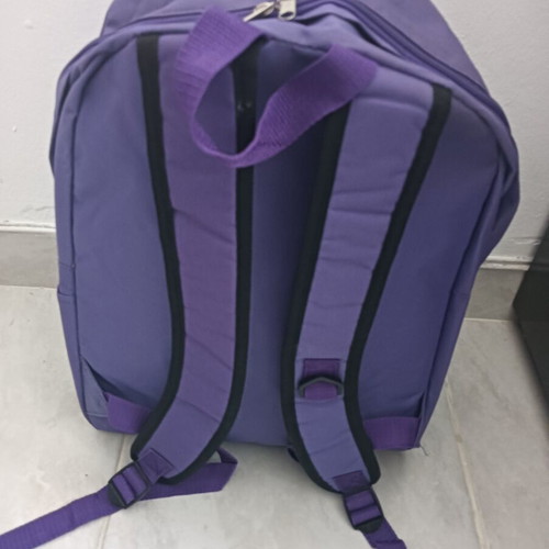 Backpack used, purple color