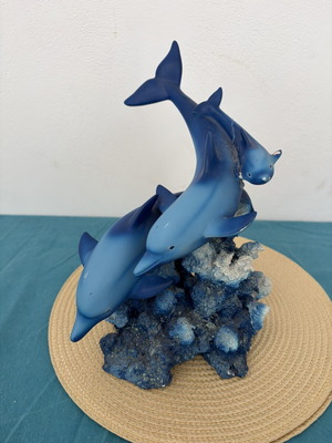 Decorative dolphins refurbished with damage