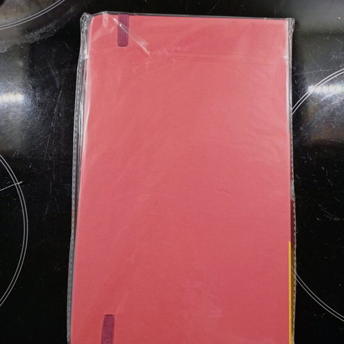 Tupperware notebook new with hard cover and elastic band