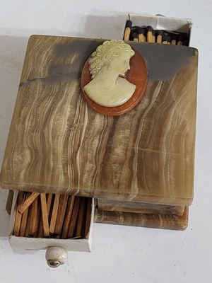 Onyx table match holder used with cameo decoration