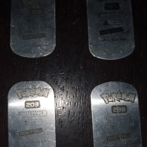 Pokemon metal tags used, set of 4 collectible