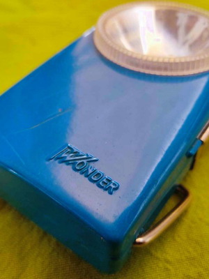 Wonder metal vintage flashlight used, electric blue