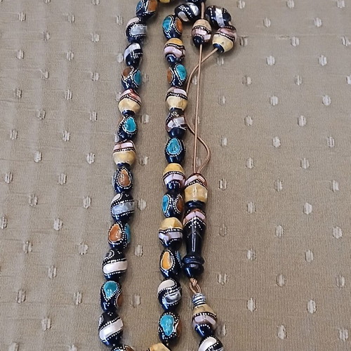 Yiousouri Worry Beads used with amber, mother-of-pearl and silver embroidery