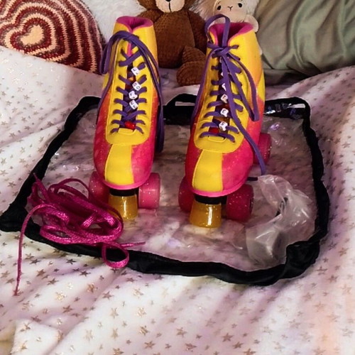 Roller skates adjustable size 35-38 like new with spare parts and case