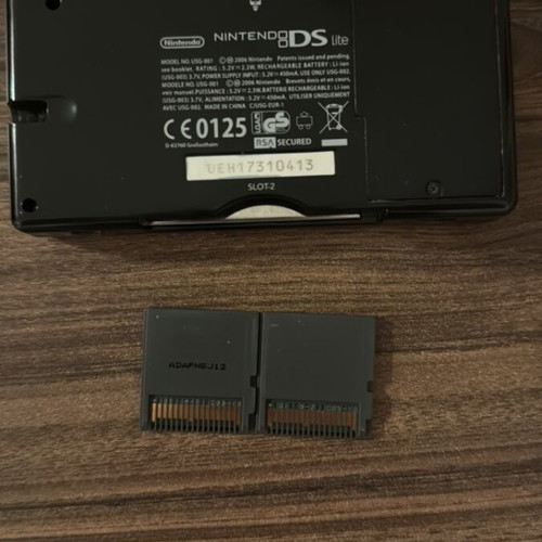 Nintendo DS Lite console like new with leather case and 2 Pokémon cartridges