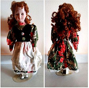 Πορσελάνινη κούκλα με κόκκινα μαλλιά