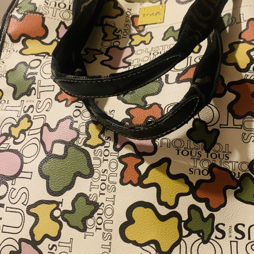 Shoulder bag used with inner pockets and detachable pouch-wallet