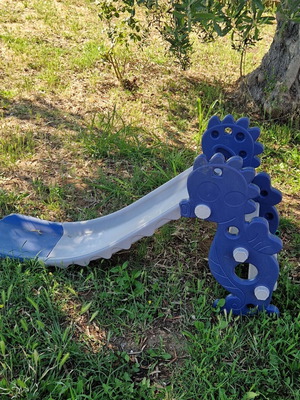 Children's slide used, folds for easy storage