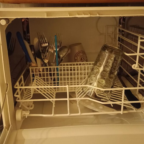 Carad countertop dishwasher used, functional with loose button