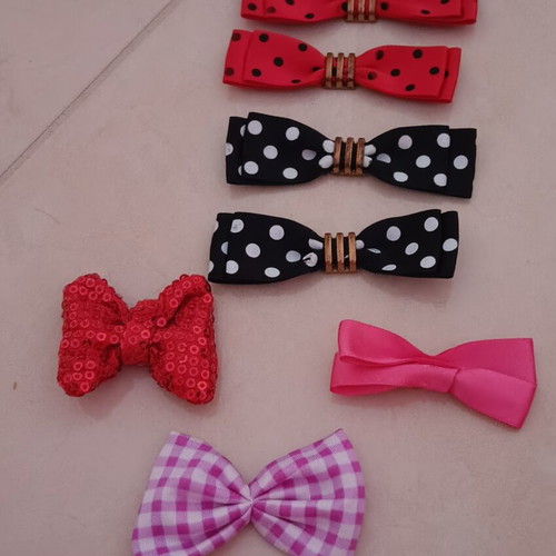 Bows like new, set of 7 multicolored