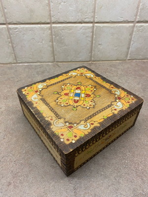 Vintage wooden box used from the 70s with carvings and color